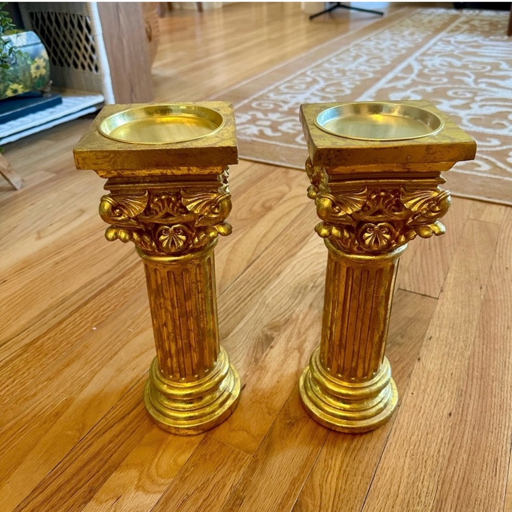 pair of gold candle pillars